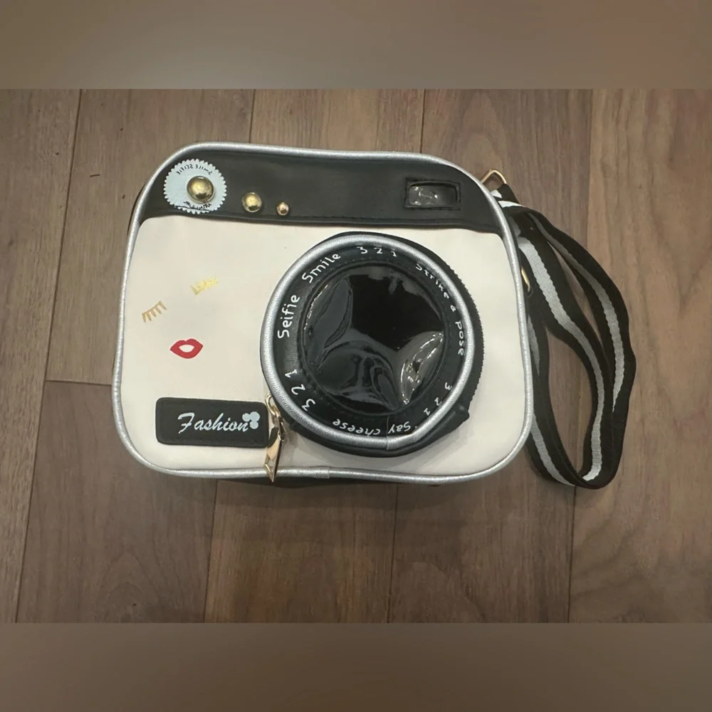 NWOT Stylish Black and White Camera Crossbody Bag